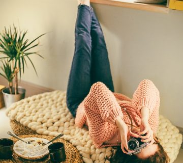 photo-of-a-woman-holding-camera-1261378
