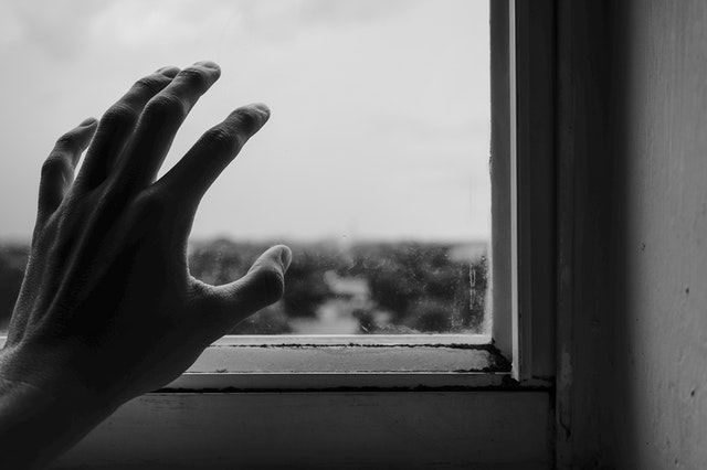 close-up-photography-of-hand-near-window-1264438