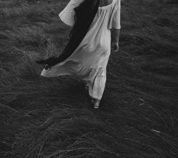 woman-walking-on-grass-3373303